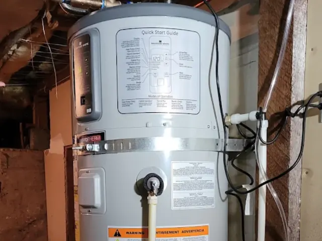 Newly installed heat pump water heater in a basement